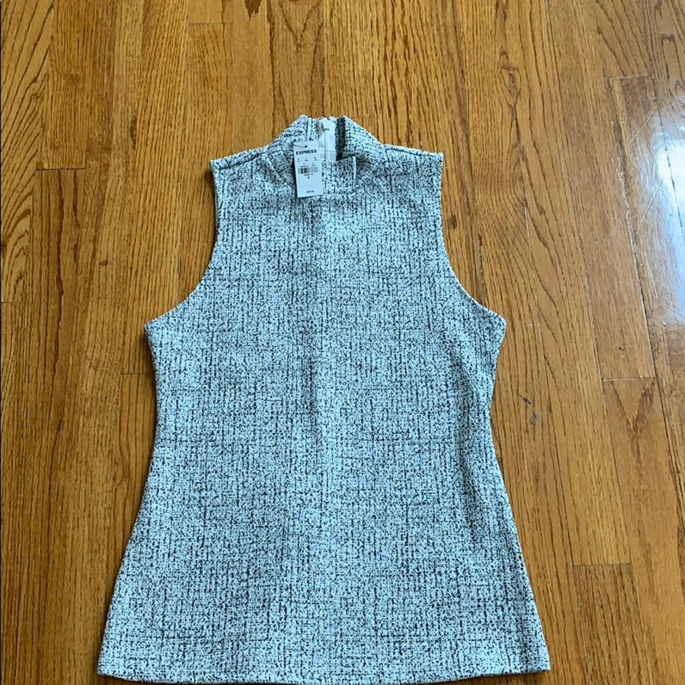 Black and white sleeveless top